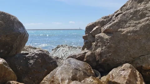 Waves crash on rocks Stock Footage 183819663