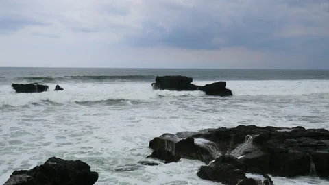 Waves crash on rocks in the Indian Ocean Stock Footage 147021401
