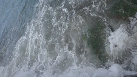 The waves crash on the rocks. Sea element, storm. Sea foam Stock Footage 279883851