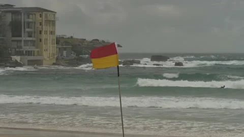 Waves crash into rocks slow motion at Bondi 4K Stock Footage 156222551