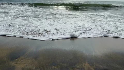 Waves crash on the Sandy beach, ocean waves on beach Stock Footage 167701700