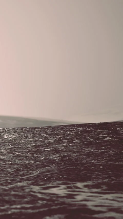Waves crash on the shore during early morning hours in a coastal area Stock Footage 334186433
