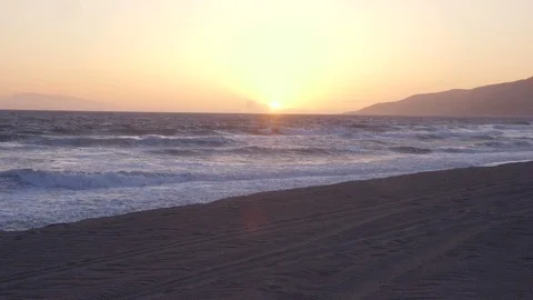 Waves Crash on Zuma Beach During Sunset - Malibu Stock Footage 89609992