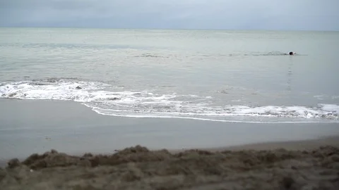 Waves Crashing against the Beach Stock Footage 92885883
