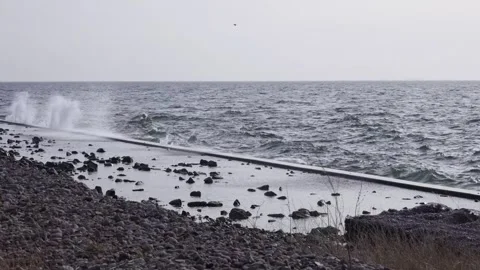 Waves crashing against the breakwater Stock Footage 171081353