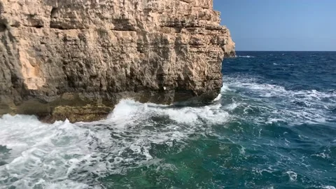 Waves crashing against cliffs in Mediterranean sea, Malta. Stock Footage 163538543