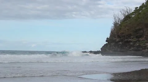 Waves crashing against rocks Stock Footage 14812401