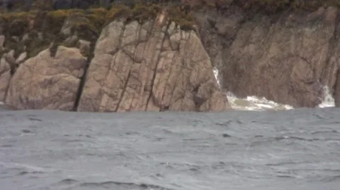 Waves crashing against the rocks Stock Footage 44366848