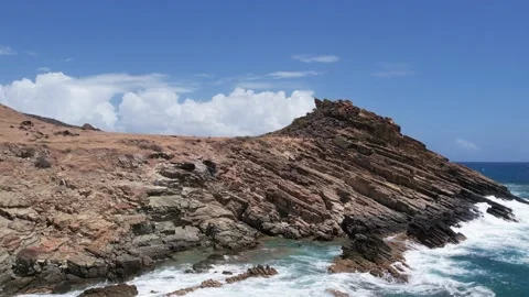 Waves crashing against rocks Stock Footage 237816382