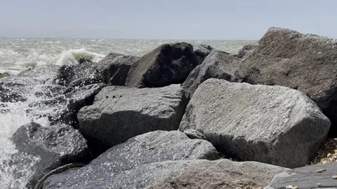 Waves Crashing Against Rocks Stock Footage 240474881