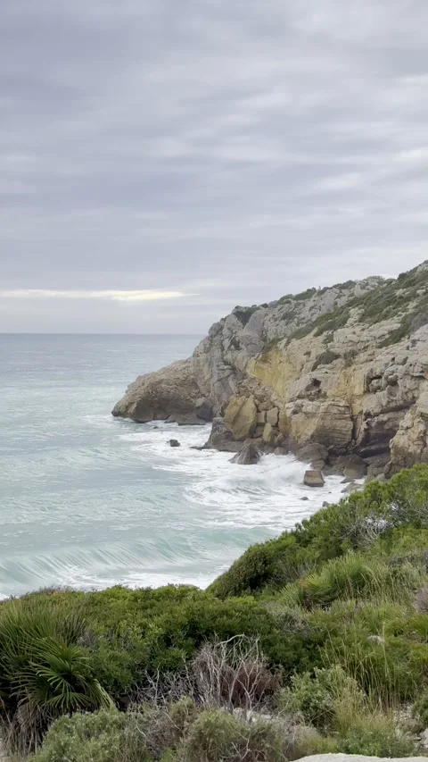 Waves crashing against the rocks Stock Footage 311512174