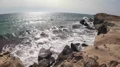 Waves crashing against the rocks Stock Footage 332794432