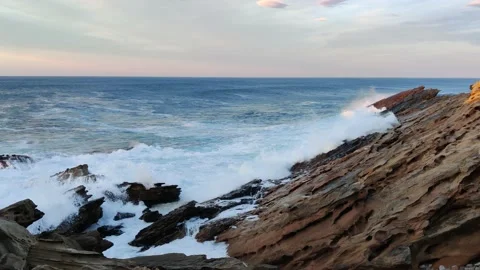 Waves crashing against the rocks of Mount Jaizkibel. Stock Footage 152932866