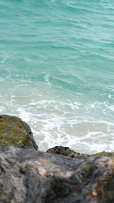 Waves crashing against rocks slow-motion Stock Footage 219619656