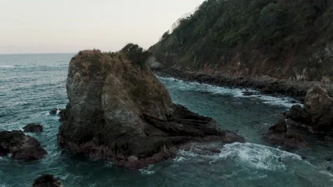 Waves Crashing Against The Sea Stack At The Mazunte Beach In Oaxaca, Video stock 169388073