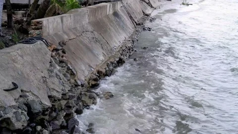 The waves crashing against the wall Stock Footage 223765521