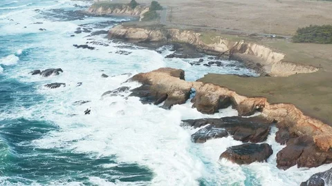 Waves crashing along the cliffs Stock Footage 127805466