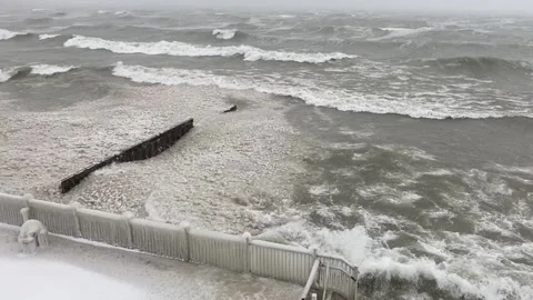 Waves Crashing Along Lake Michigan's Illinois Shore During Winter Storm Stock Footage 147440121