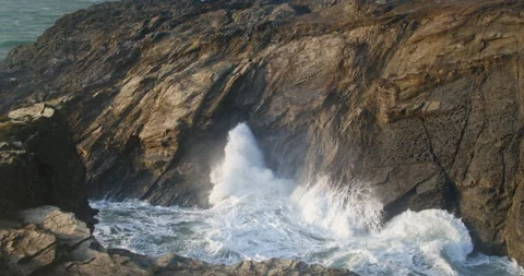 Waves Crashing and Blowhole Explodes In Rocky Coastal Landscape, Porth Stock Footage 168992731