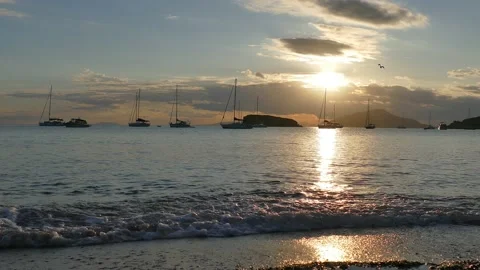 Waves crashing ashore on sunset Stock Footage 136544296