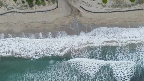 Waves Crashing on Beach – Aerial View of Shoreline Impact (4K Drone) Stock Footage 310181054