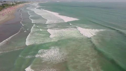 Waves crashing on the beach in bali Stock Footage 80842421