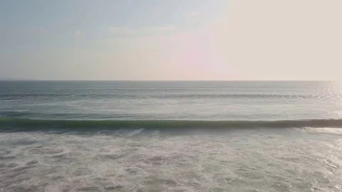 Waves crashing on the beach in bali Stock Footage 80842495