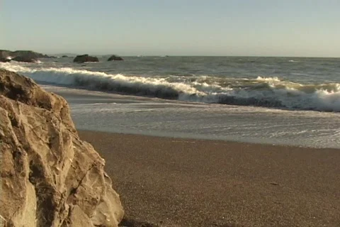 WAVES CRASHING ON A BEACH Stock Footage 125196