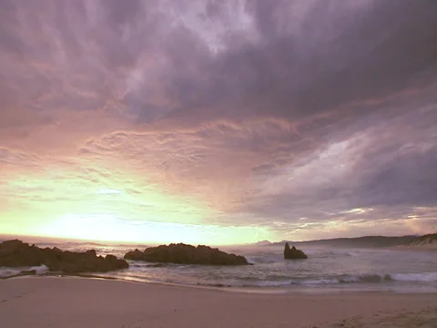 Waves crashing on the beach Stock Footage 27359679