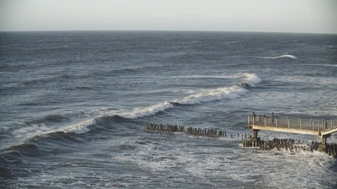 Waves crashing on the beach Stock Footage 95936526