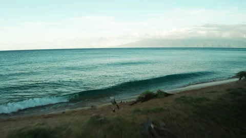 Waves crashing on beach Stock Footage 163929065