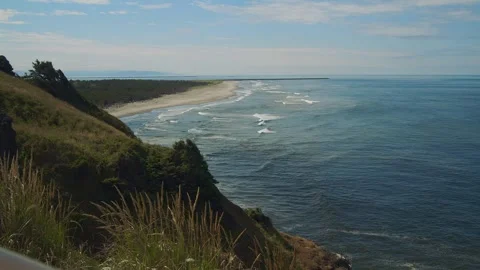 Waves crashing on a beach Stock Footage 262792823