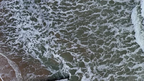 Waves crashing on beach Stock Footage 266163422