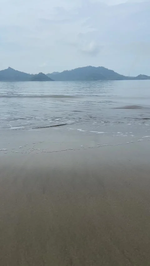 Waves crashing on the beach Stock Footage 276676228