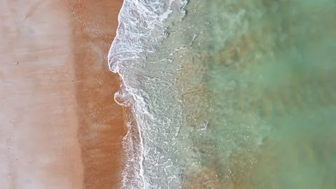 Waves crashing on the beach in Ormond Beach, Florida. Stock Photos