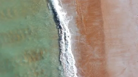 Waves crashing on the beach in Ormond Beach, Florida. Stock Photos