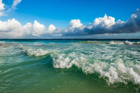 Waves crashing on the beach Stock Photos