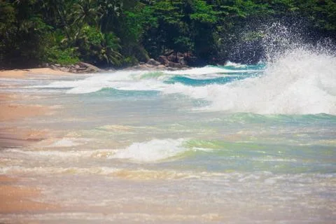 Waves crashing on the beach Stock Photos