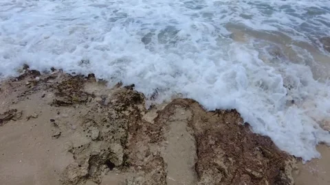 Waves Crashing on Beach Rocks Video stock 248332211