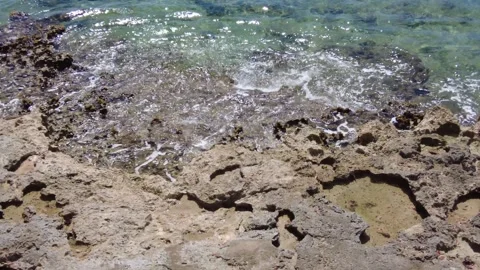 Waves Crashing on Beach Rocks Video stock 248332250