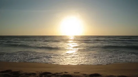 Waves Crashing On Beach As Sun Sets Video stock 85239852