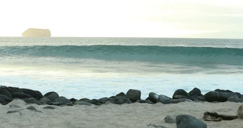 Waves crashing on the beacj Stock Footage 98711093