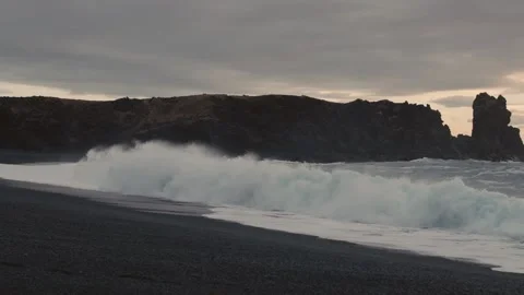 Waves Crashing on Black Sand Beach in Iceland Video stock 307287156