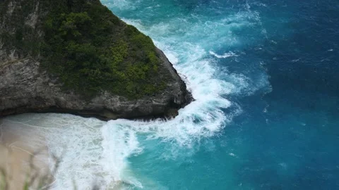 WAVES CRASHING AT THE BOTTOM OF CLIFF 스톡 동영상 221670047