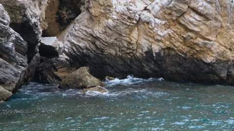 Waves crashing on cliffs Stock Footage 254730361