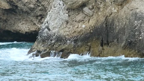 Waves crashing on cliffs Stock Footage 254730866