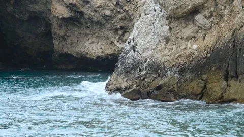 Waves crashing on cliffs Stock Footage 254730999