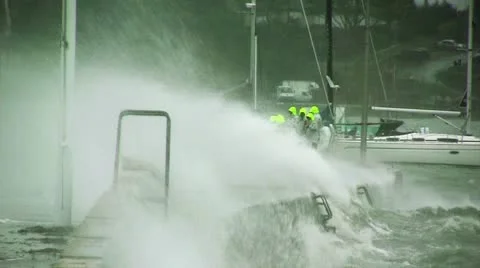 Waves crashing on a dock Stock Footage 10747626