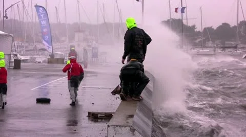 Waves crashing on a dock Stock Footage 10749759