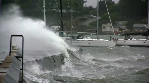 Waves crashing on a dock Stock Footage 10751182